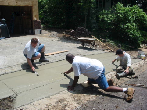 George, Ben and Randy float and finish the sidewalk